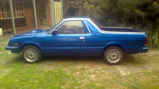 Illustration for article titled Some Crazy Aussie Stuffed A Turbo Rally Car Engine Into This Tiny Subaru BRAT